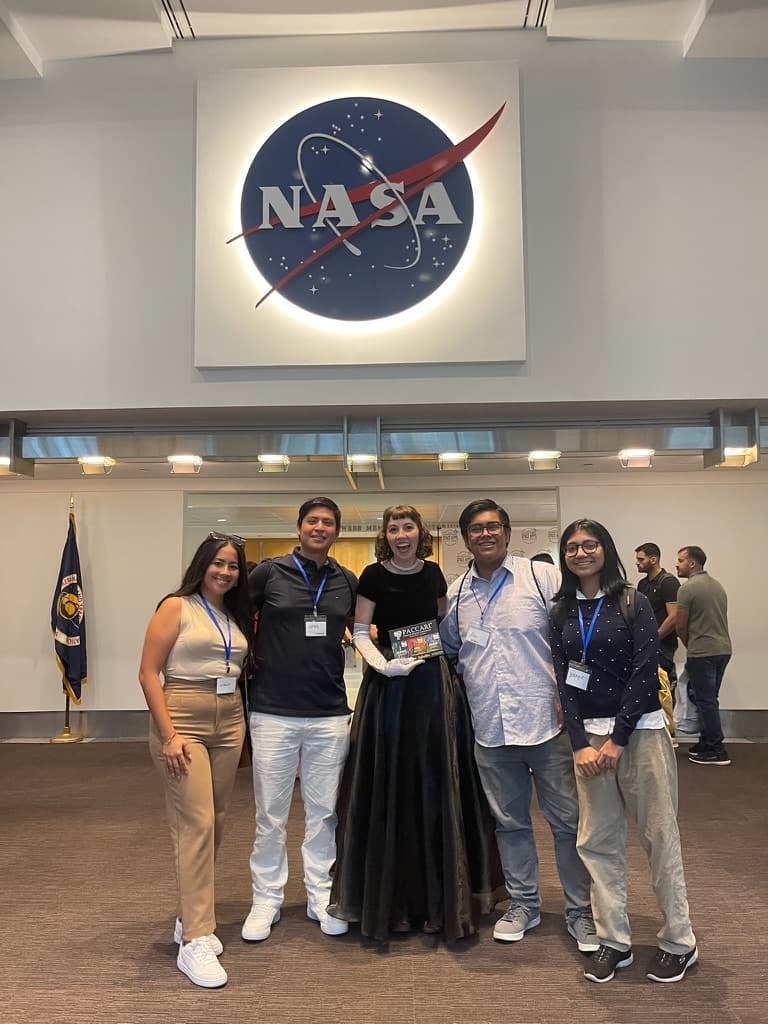 The team under the NASA insignia